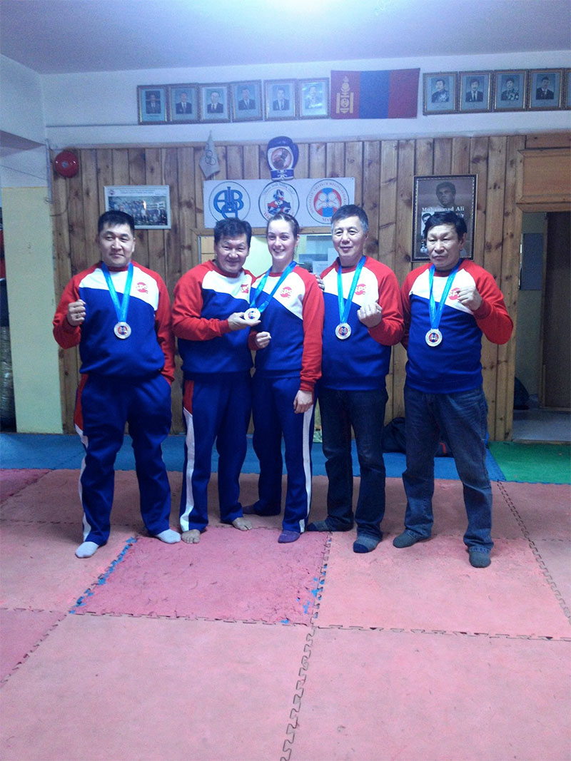 Isabelle Maffat with four coaches of "Shiren Beelii" boxing club