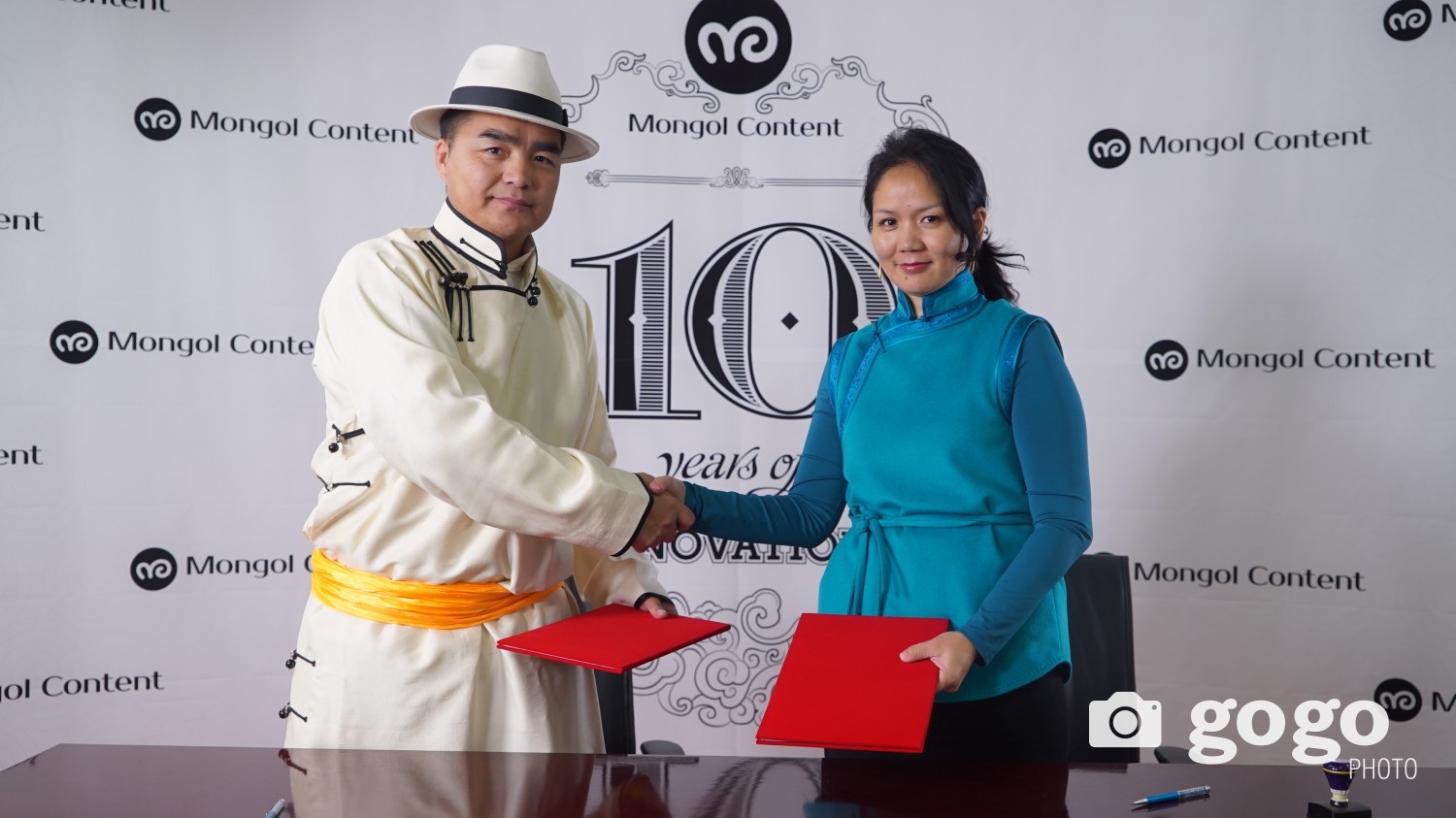 Cooperation agreement signed by Singer D.Namsrainorov and CEO of Mongol Content LLC G.Gantuya 