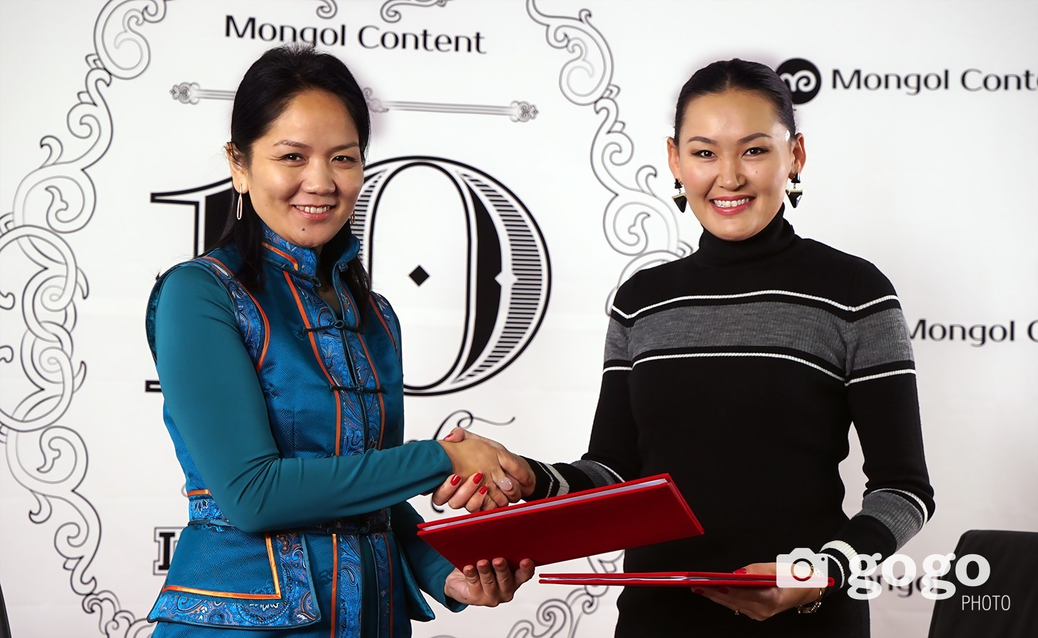 Cooperation agreement signed by Singer D.Uuriintuya and CEO of Mongol Content LLC G.Gantuya 