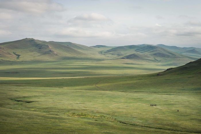 PHOTO: Riders are dwarfed by the vast landscapes of Mongolia. (Mongol Derby: Richard Dunwoody)